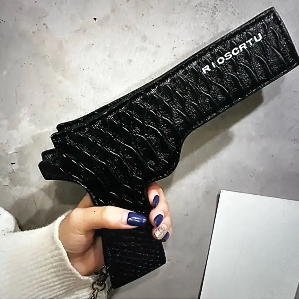 Black pistol shaped hip holster mini little purse handbag.